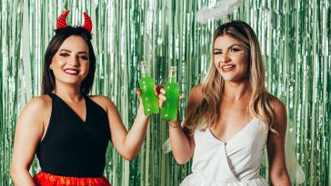 Brazilian Carnival. Young women in costume enjoying the carnival party