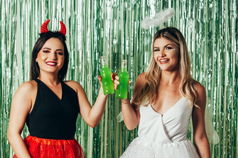 Brazilian Carnival. Young women in costume enjoying the carnival party