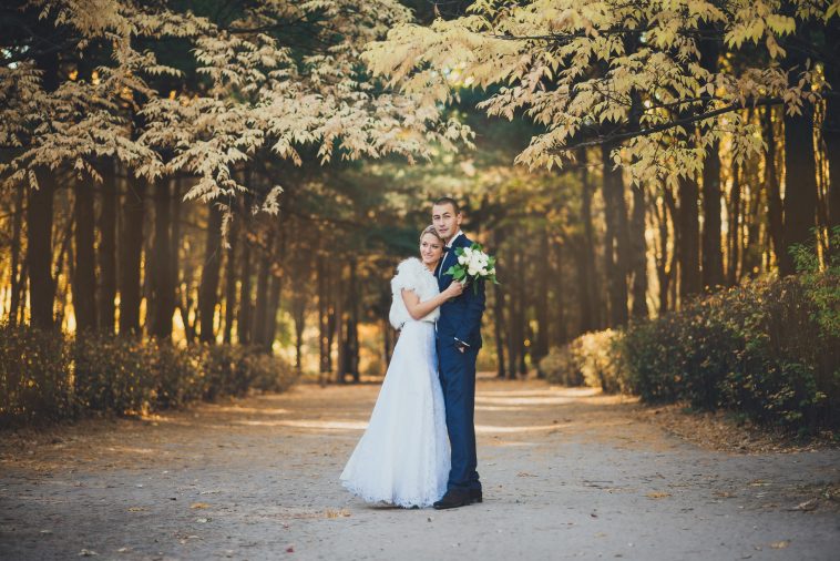 bride and groom in autumn park Love Life