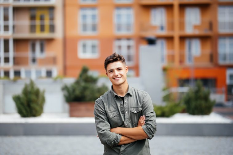 portrait of a trendy young man in the city