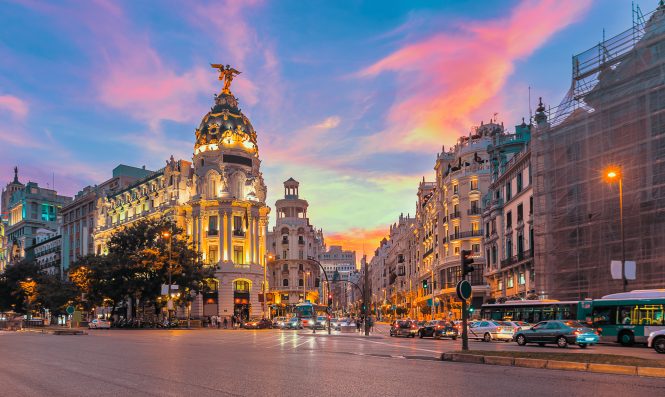 Madrid city skyline gran via street twilight , Spain