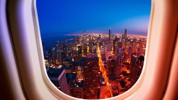 Chicago Illinois USA panorama view from plane window illuminator during flight