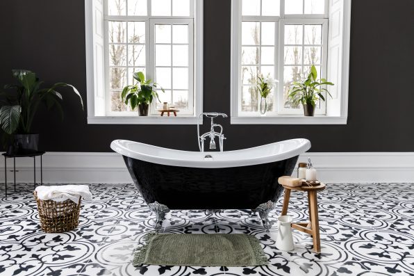 Interior of modern luxury minimalistic bathroom with window.