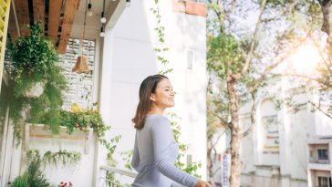 Woman enjoy her coffee at the balcony