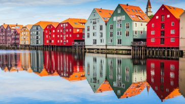 Trondheim, Norway. Colorful timber houses and Nidelva river in the old town district.