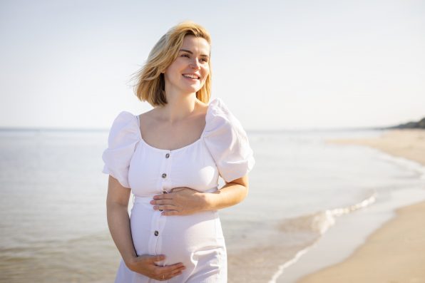 Healthy relax on a seashore during pregnancy