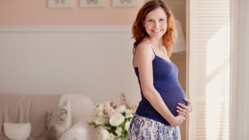 Home portrait of pregnant woman