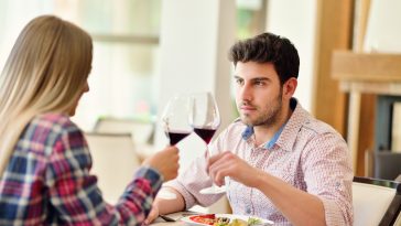 romantic lunch in a fancy restaurant.couple sitting and eating at lunch time.