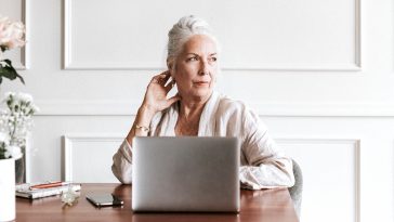 Senior businesswoman using a laptop