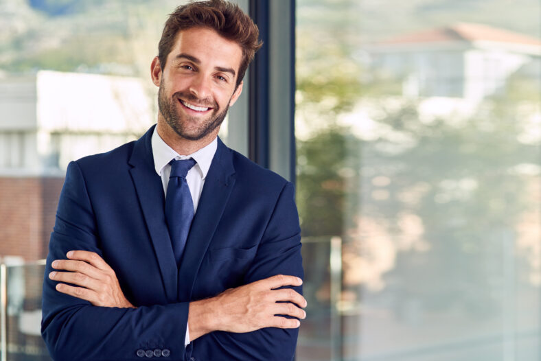 Portrait of a businessman standing in his office.