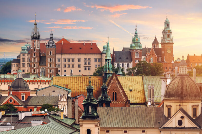 Collage of Krakow landmarks in the evening with dramatic sunset.