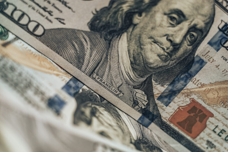 Close up Franklin's face on a one hundred dollar. American, US Dollars Cash Money background.