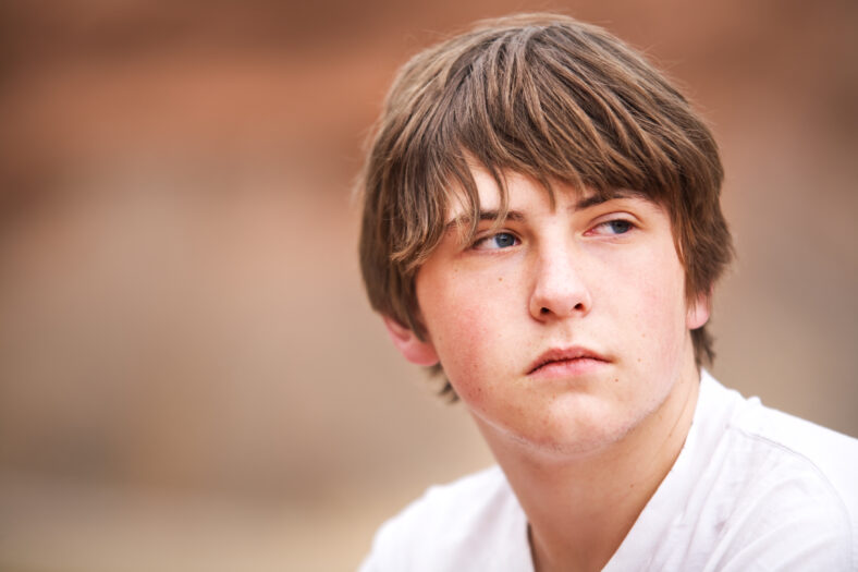 natural teen portrait against blurred background